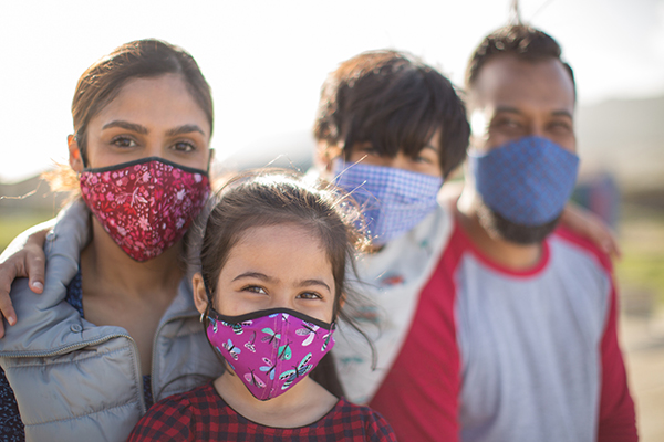 Family wearing masks