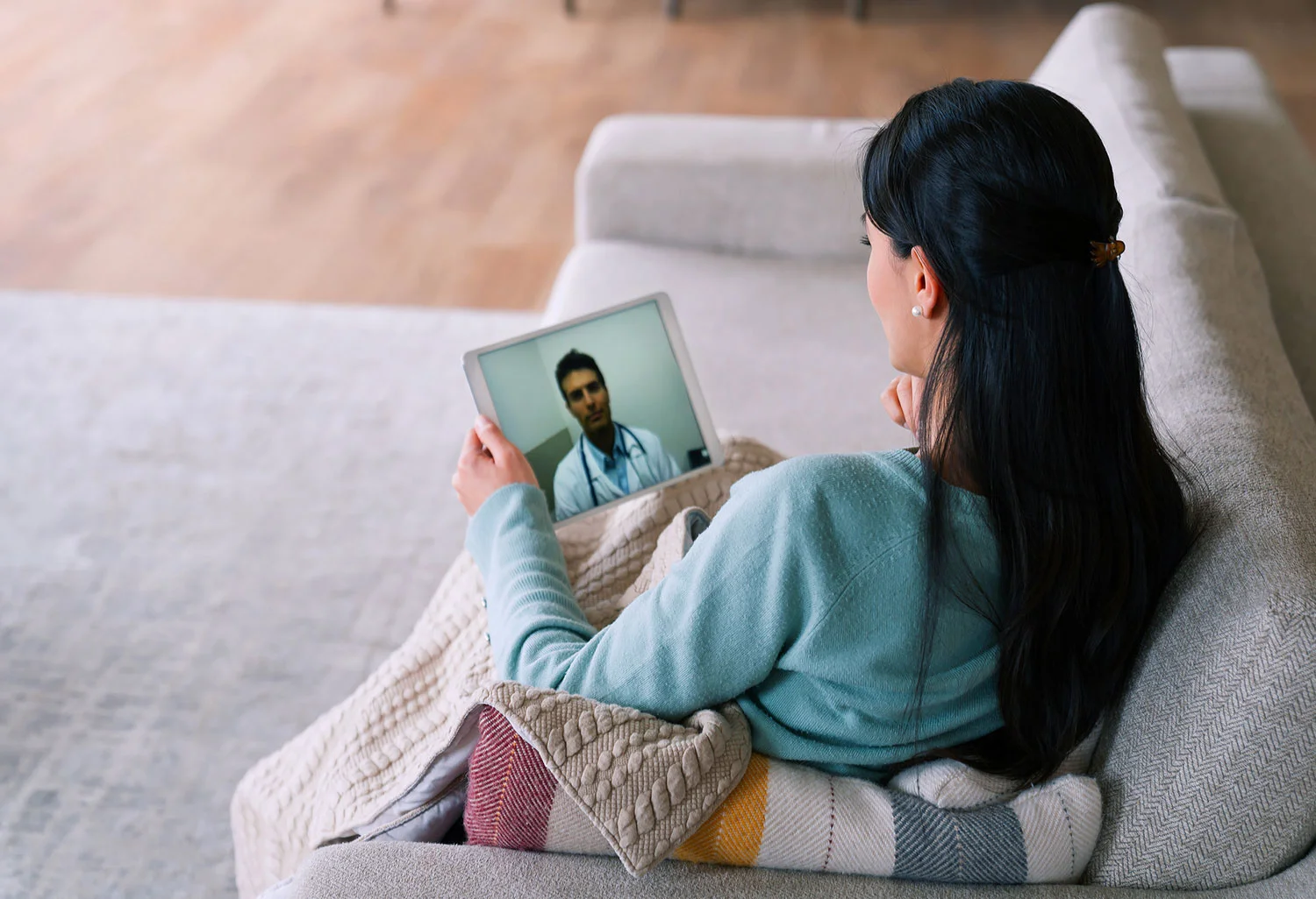 Woman with doctor on video call